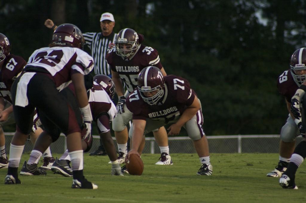 Center+Ethan+Griffin+prepares+to+snap+against+Fulton+last+week.+Bearden+is+looking+for+its+first+win+against+Heritage.
