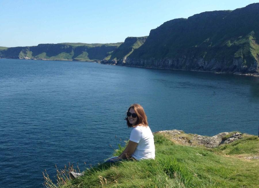 Editor-in-chief Kelsey Kinzer enjoys a clear day on the coast of Northern Ireland during her trip abroad this summer.