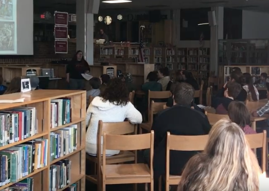 A representative from UT speaks to students at last year's Marco Madness – a collaborative effort of Latin Club and History club.