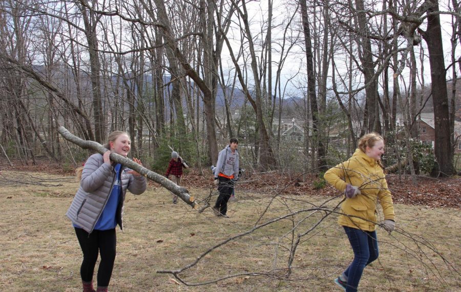 Maitlyn Phillips (left) and Lydia Steimer (right) work on last years service project at Black Mountain Home.
