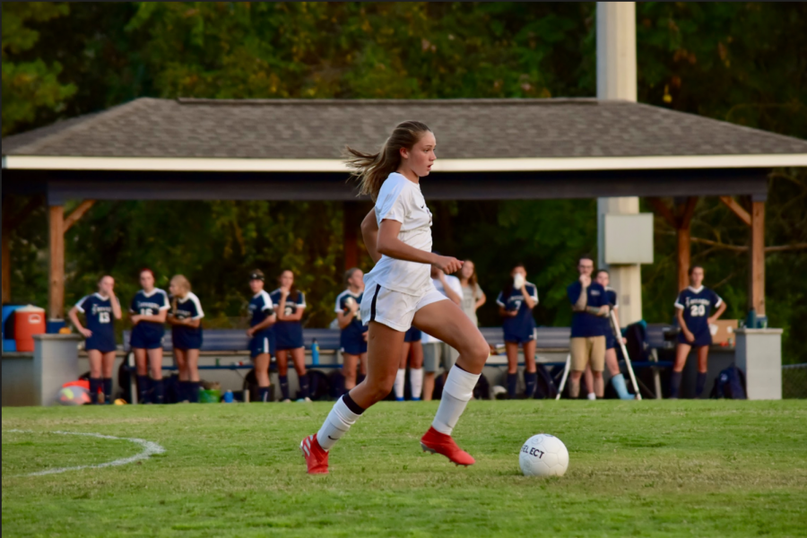 Senior Harlie Howard carries the ball in a game against Farragut in 2019.