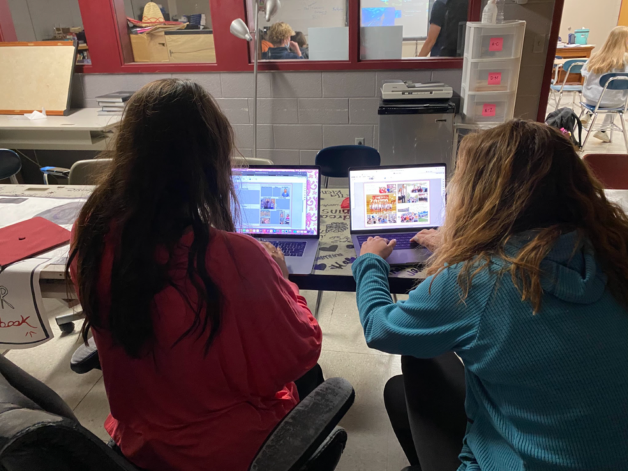Bearden annual editors Ellie Foster and Anna Moore work on designing the 2021-22 yearbook.