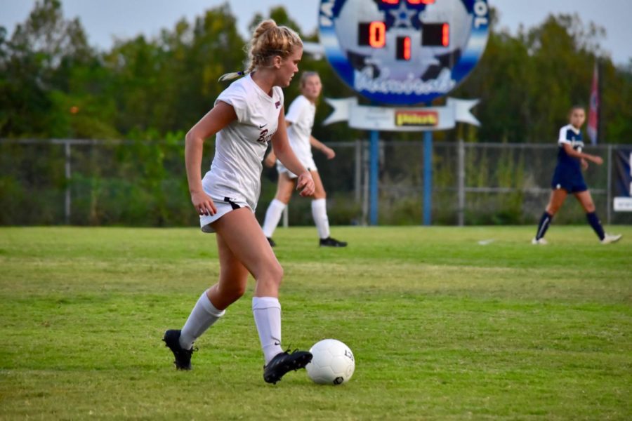 Brinley+Murphy+looks+for+her+next+move+in+a+game+against+Farragut+in+2019.+Murphy+and+the+rest+of+the+senior+class+have+been+integral+to+the+program+since+they+were+freshmen%2C+and+as+seniors%2C+theyre+looking+for+back-to-back+state+titles.