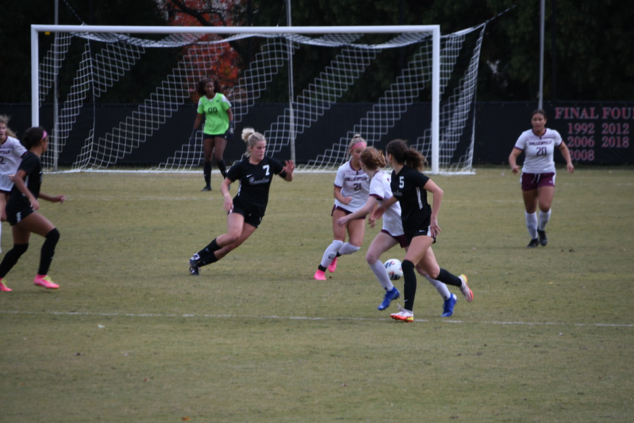 Brinley Murphy works to win the ball back from Collierville in Wednesdays 4-0 win in a state quarterfinal.