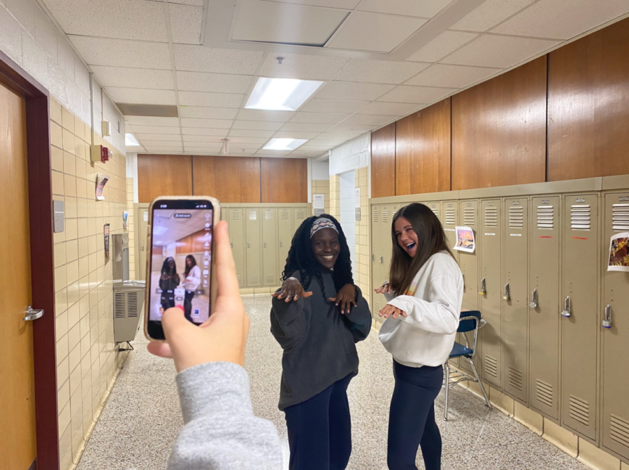 Teenagers say one of the reasons they flock to TikTok over other platforms is because it also sparks in-person interaction, such as 
the dance that juniors Elle Kate Huck and Lydia Lively perform here.