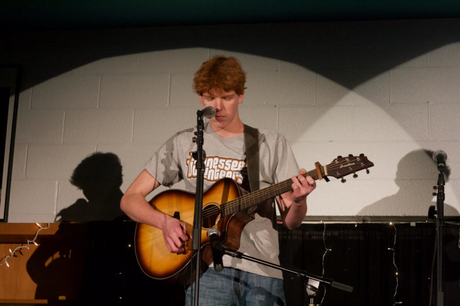 Senior Anderson Puckett performs at last weeks Coffee House in the library.