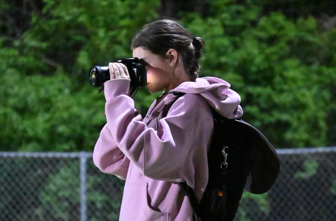Bearden sophomore Landry McMurray takes pictures at a boys soccer game last spring.