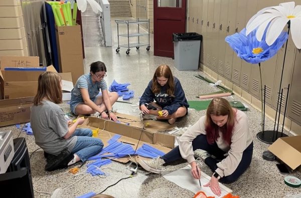 Prom committee members work on decor at a recent meeting before school.