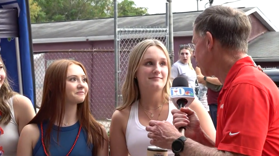 Junior SGA members Harper Wolfe and Mirabelle King speak with WBIR after this month's Second Harvest fundraising event.