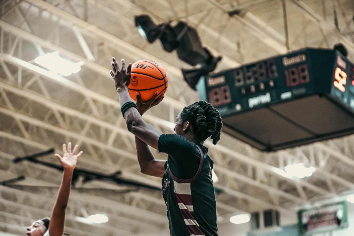 Senior King Hubbard goes up for a jump shot in a recent game.