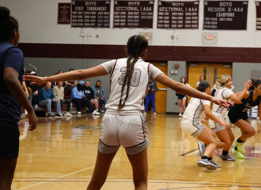 Senior Aisha Patel patrols the post on defense. She has become an even better rebounder as a senior.