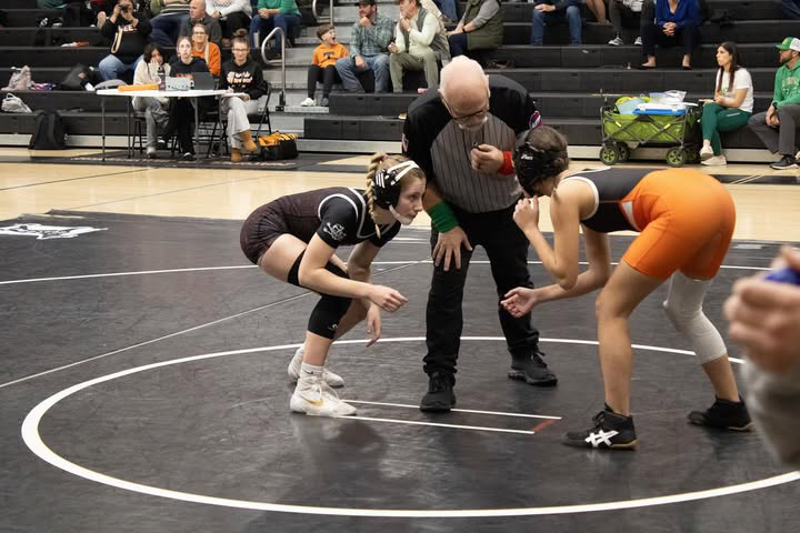 Sadie Somerville (left) wrestles in a recent competition.