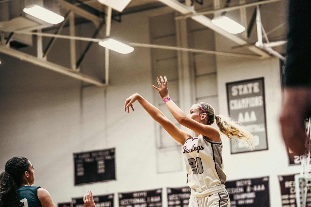 Junior Emma Rainey makes a jump shot in a recent game.