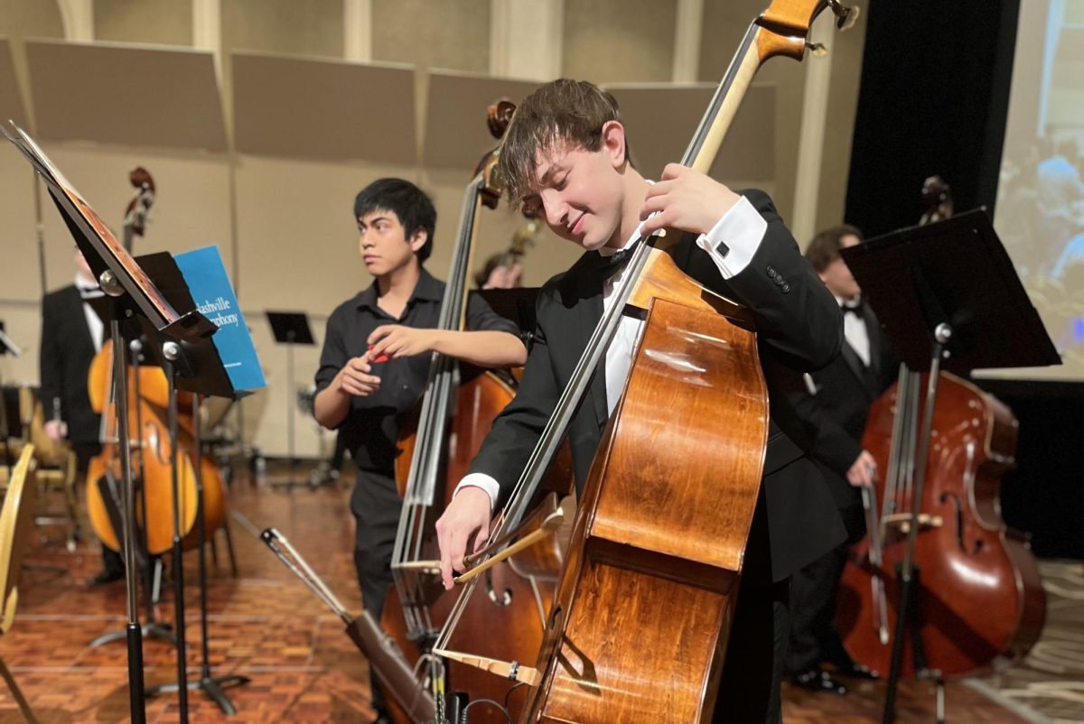 Senior Logan Franklin warms up before a performance. Franklin will attend Berklee College of Music next year.