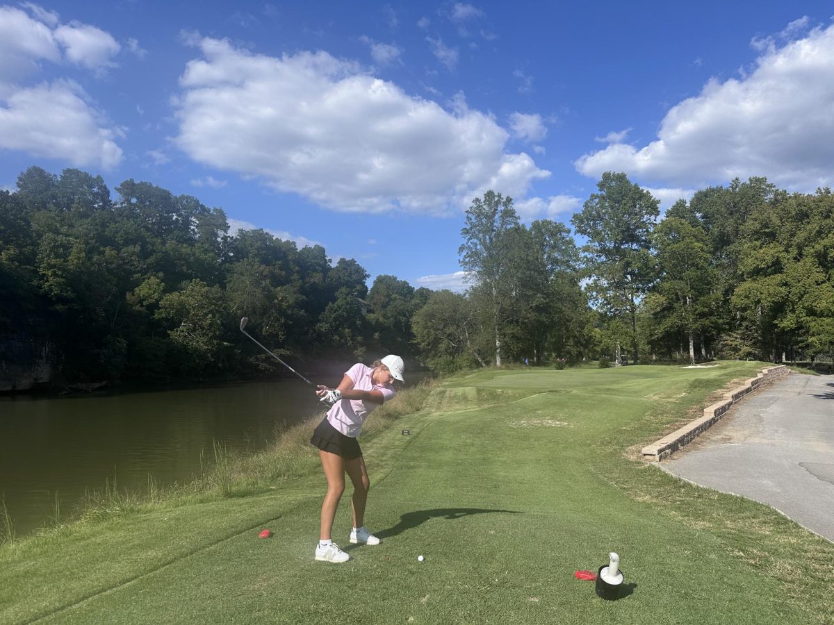 Sophomore Caroline Sellers tees off at Island Pointe Golf Club earlier this month.