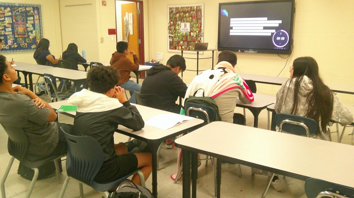 Bearden English language learners complete an activity in Ms. Anna Saeli's class.