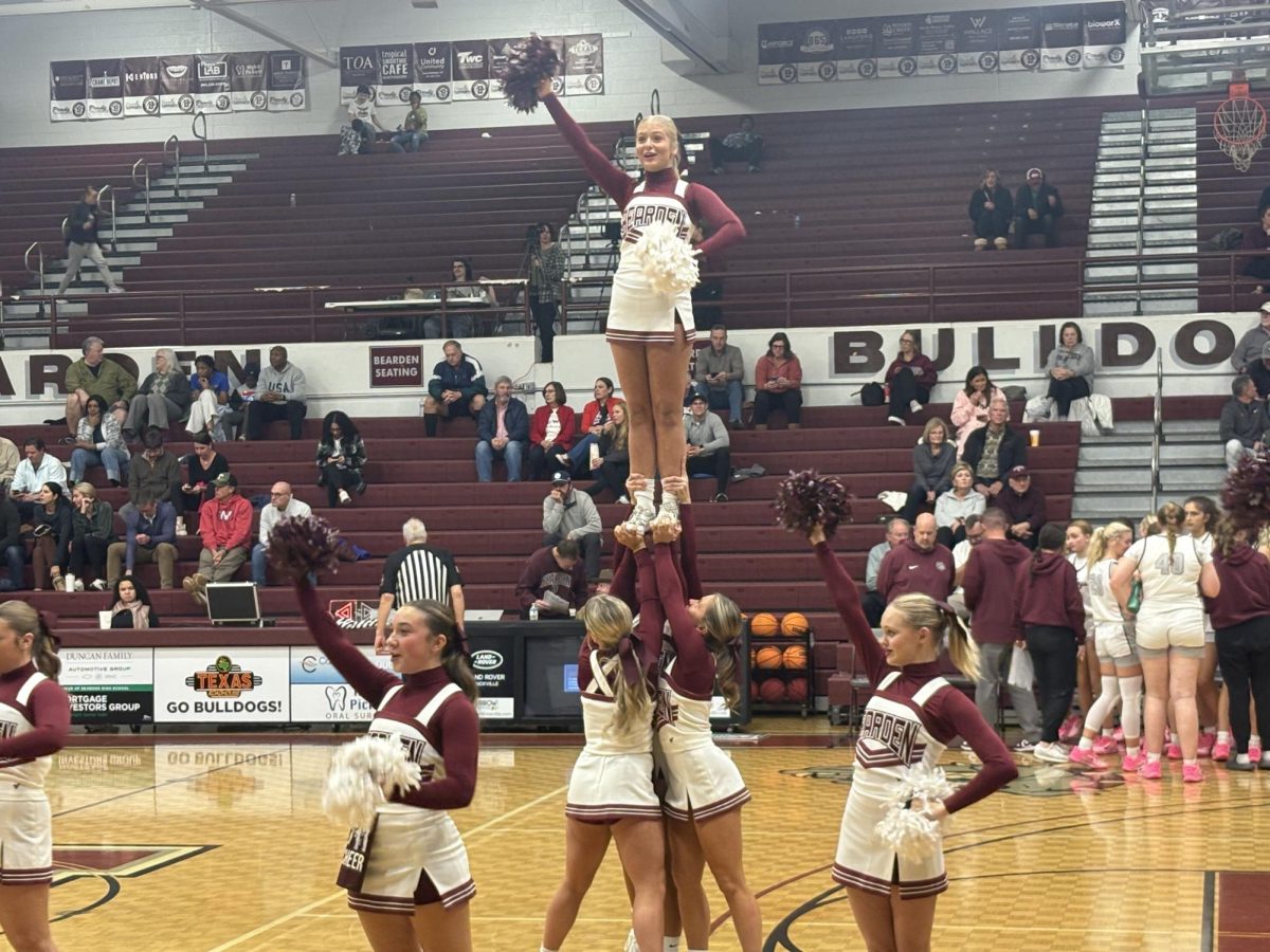 The Bearden cheer team performs at a recent home basketball game.