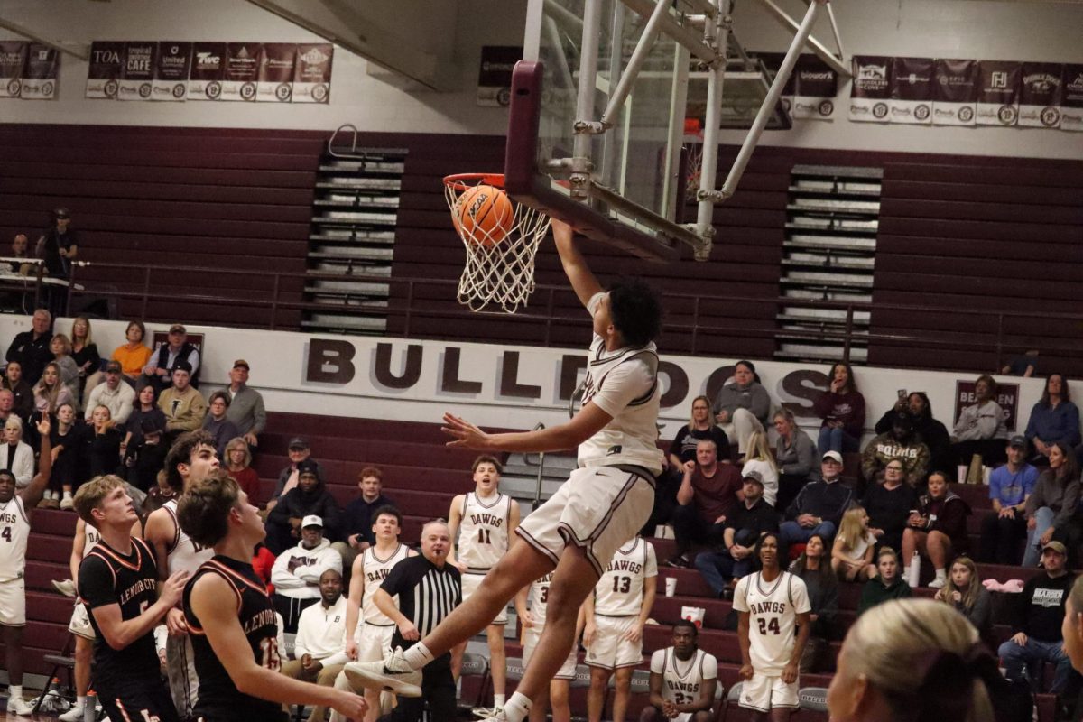 Sean Capshaw throws down a one-handed dunk in Bearden's 81-49 win over Lenoir City on Jan. 6. The senior forward leads the Bulldogs into the postseason this week.