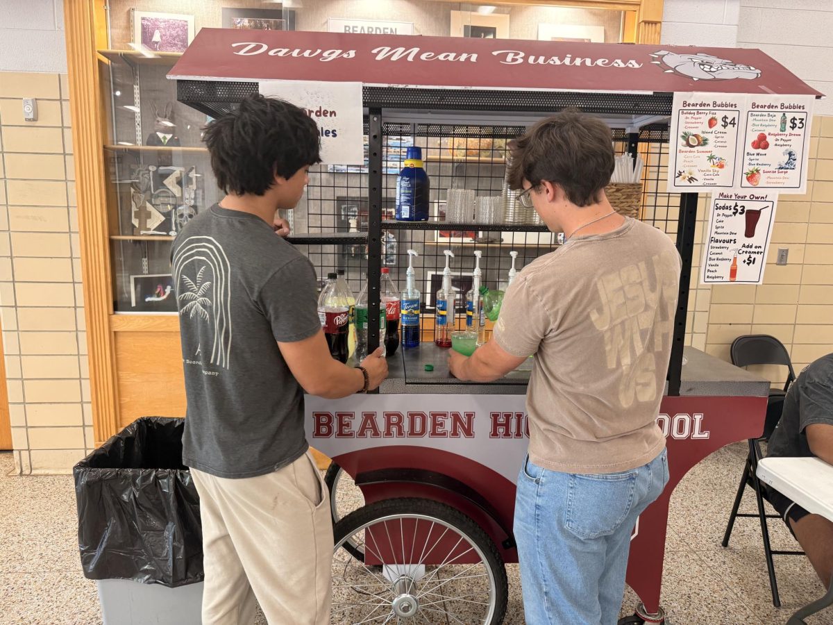 Virtual Enterprise opens soda stand during lunch to fundraise for NYC trip